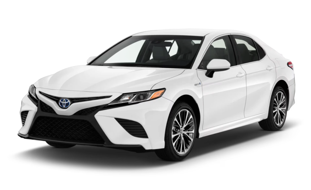 Toyota Camry sedan used for Umrah Taxi Service in Saudi Arabia, offering comfortable Ziyarat and city rides